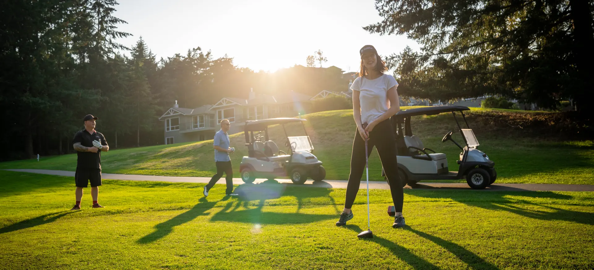 REW team members playing golf