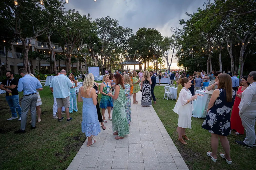 People attending luxury dinner in Florida evening